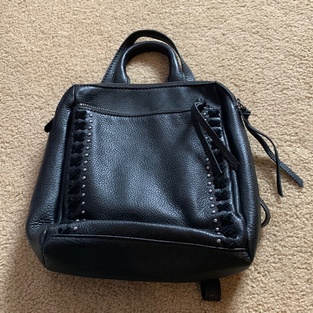 The Sak black small leather backpack/purse